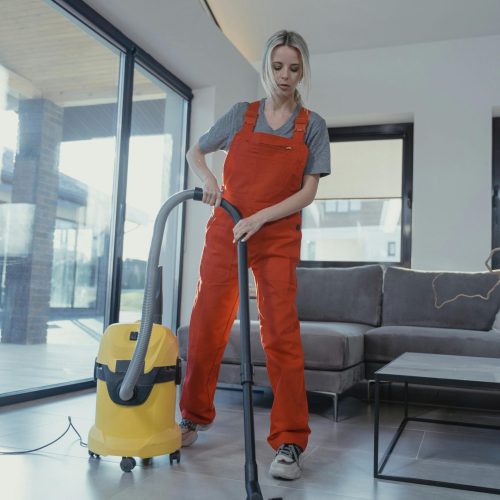 Professional floor cleaning service by Cleanorama – vacuuming carpets, mopping hardwood and tile floors, removing dirt, stains, and scuff marks.